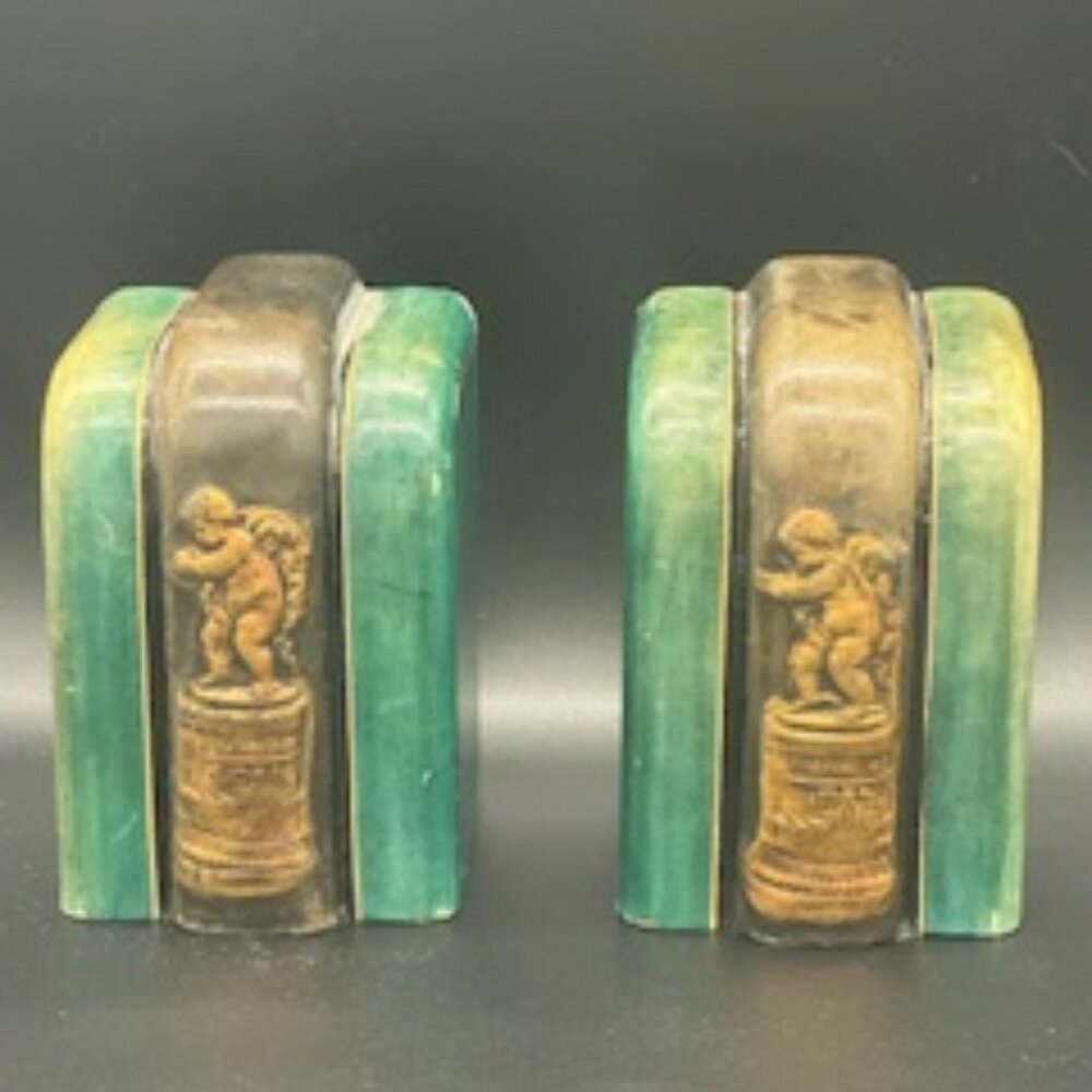 Pair of Italian Leather Clad Figural Cherub Bookends, Circa 1930